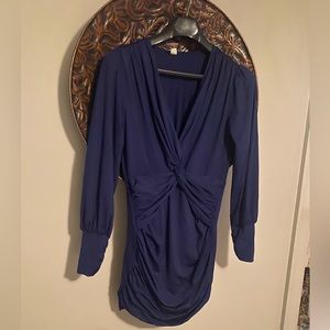 Cobalt blue mini dress. Rushed fabric. Low cut.